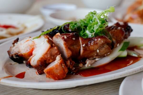 Sliced roasted chicken on the plate